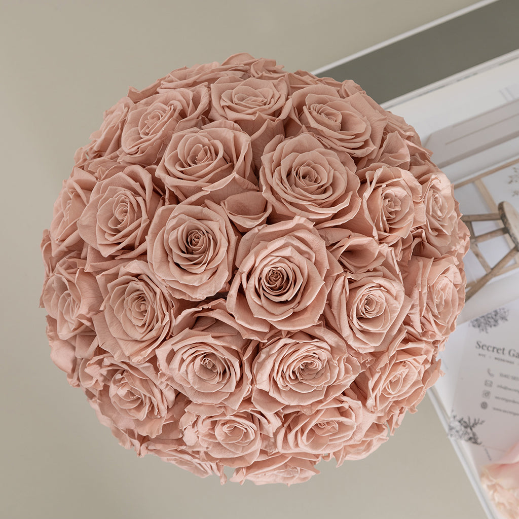 Bouquet of 36 preserved pale roses.