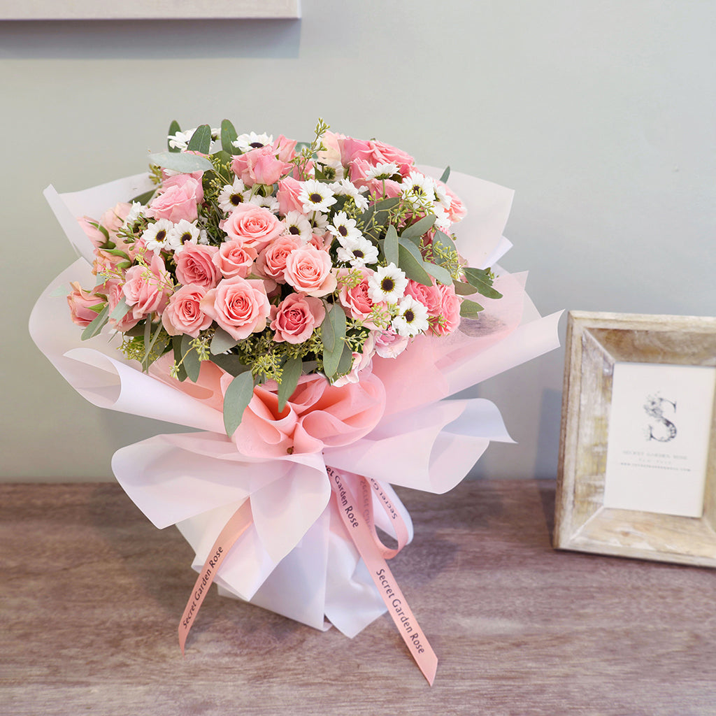 Bouquet of Pink Spray Roses, and Yin Yang Daisies with Seeded Eucalyptus greeneries.