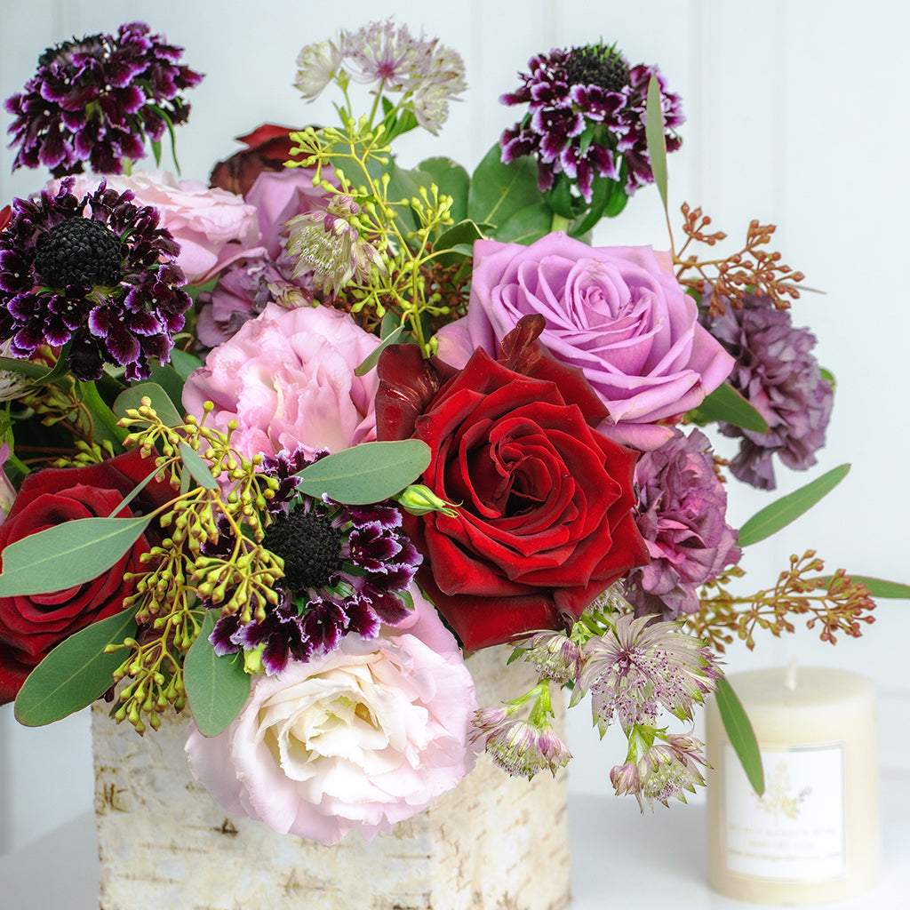https://secretgardennyc.com/cdn/shop/products/chelsea-bundle-of-pink-lisianthus-cool-water-roses-freedom-roses-scabiosa-and-carnations-with-pittosporums-and-seeded-eucalyptus-greeneries-2.jpg?v=1673646514