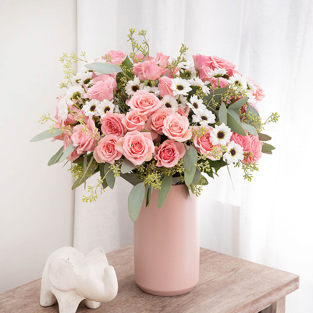 Bouquet of Pink Spray Roses, and Yin Yang Daisies with Seeded Eucalyptus greeneries.