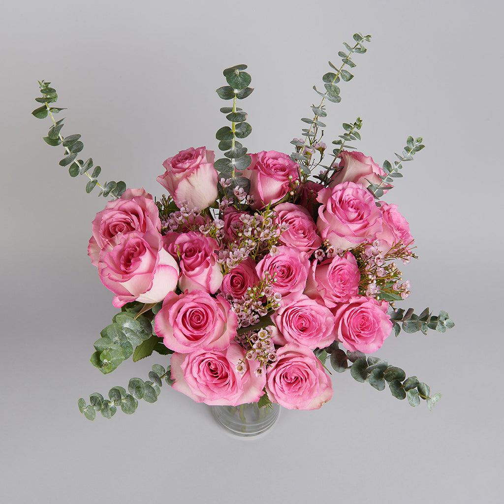 Bouquet of Sweet Uniqlo Roses and Wax with Eucalyptus greeneries.